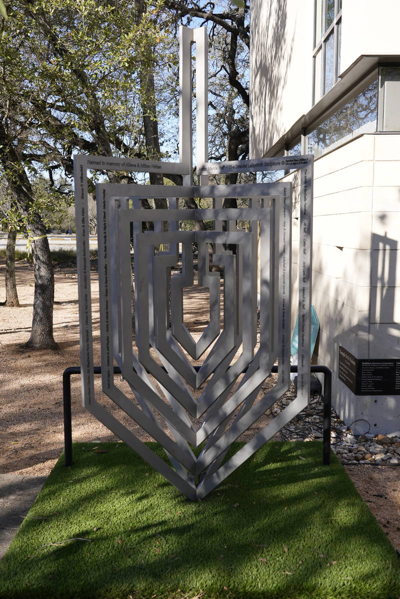 Dreidel Labyrinth sculpture in front of Temple Beth Shalom building